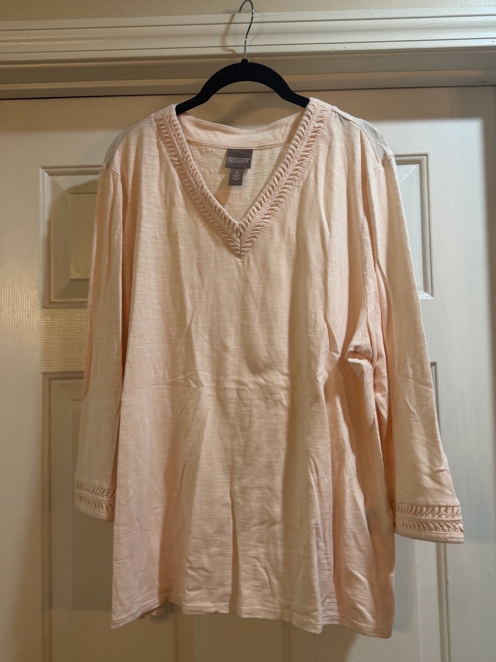 Chicos size3/xl P2P23” light pink Vneck top with details around neck & sleeve